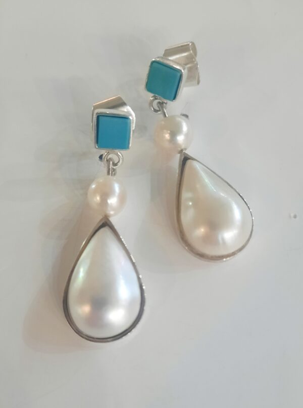 Pendientes largos de perlas